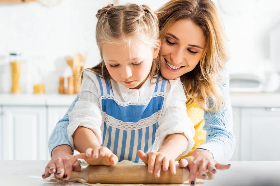 Photo: Mom and daughter baking